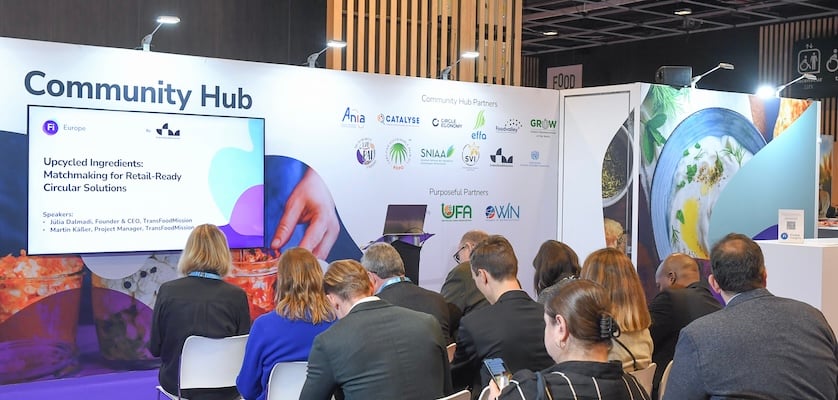 Two people networking at Fi Europe