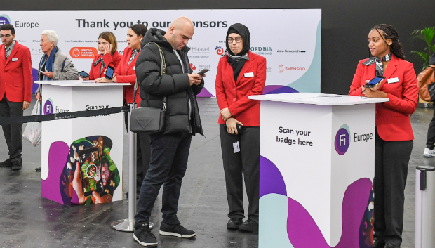 An Attendee at Fi Europe check into the event