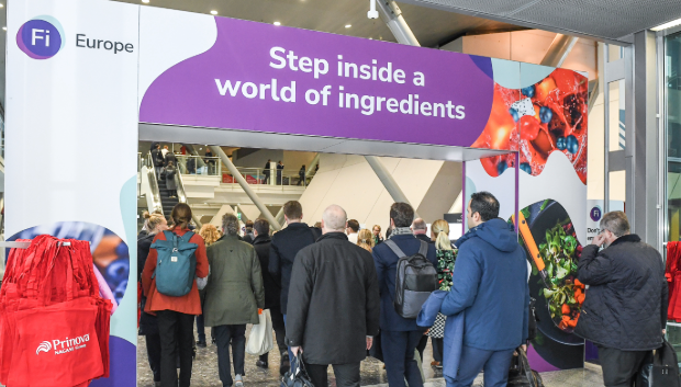 A group of attendees entering Fi Europe